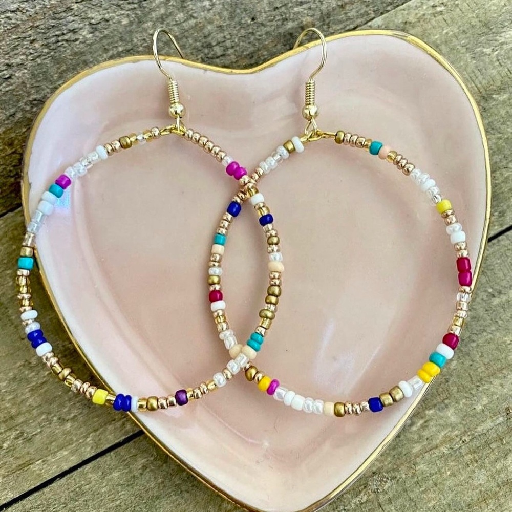 Beautifully handmade, beaded hoop earrings.  2.5” length